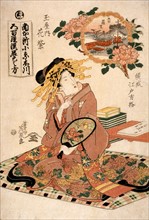 La courtisane Hanamurasaki de la maison de thé Tamaya représentée avec un éventail à la main