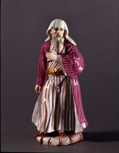Porcelain statuette of an Old Jew in porcelain