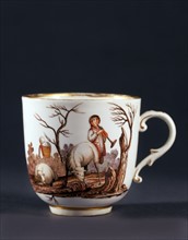 Coffee cup decorated with a rural scene