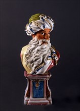 Bust of an old oriental man, on a pedestal
