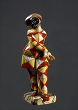 Harlequin, painted porcelain figurine