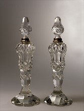 Crystal and silver perfume bottles.