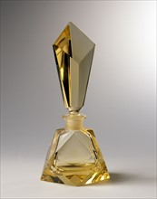 Yellow crystal perfume bottle.
