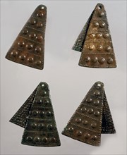 Bronze female pendants