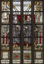 Martin Luther and Martin Rinckart. Stained glass window of the church of Sainte-Anne in Eisleben