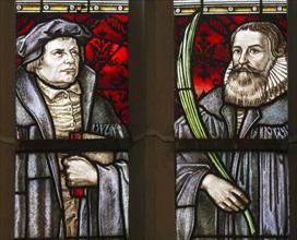 Martin Luther and Martin Rinckart. Stained glass window of the Sainte-Anne church in Eisleben (detail)