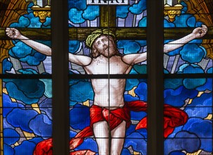 Christ on the Cross. Stained glass window of the Schlosskirche in Wittemberg