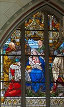 The Adoration of the Magi. Stained glass window of the Schlosskirche in Wittemberg