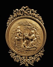 Médaillon en bronze doré représentant le Sacrifice du Dieu Amour