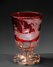 Red stemmed Bohemian glass, engraved with hunt scene