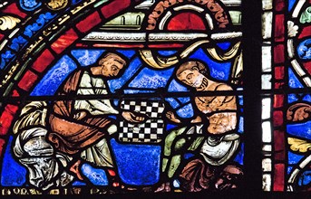 Parabole du fils prodigue : les risques du jeu (vitrail de Chartres)