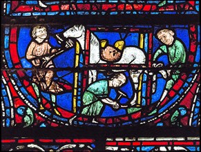 Le travail du maréchal-ferrant (vitrail de Chartres)