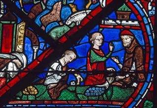 Changeurs d'argent (vitrail de Chartres)