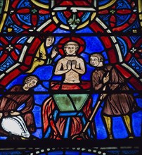 Le martyre de saint Pantaléon plongé dans une cuve remplie de plomb fondu (vitrail de Chartres)