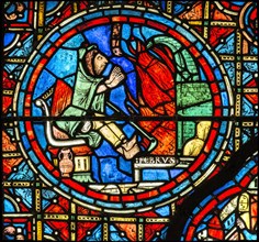 Un paysan se réchauffe au coin du feu (vitrail de Chartres)