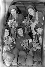 Infirmières américaines à leur retour des plages de débarquement en juin 1944.