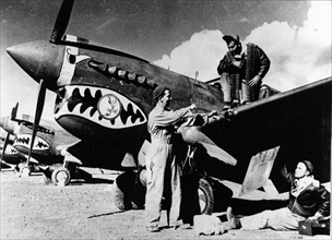 U.S crew checks over P-40