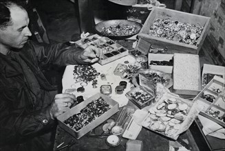 German loot from Buchenwald Concentration Camp atrocity victims (April 1945)