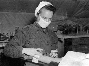 Battlefront nurse somewhere in Normandy (Summer 1944)