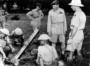 British General Sir Claude Auchinleck visits  a Chinese-American training center in India (1944).