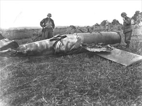 A  German V-1 flying Bomb lies unexploded in French field (Fall 1944)