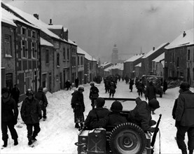 Members of the 87th U.S Div. enter the town of St Hubert (Belgium) 1945