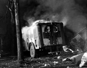 A U.S. Ambulance burns in Nijmegen (Holland) October 29, 1944