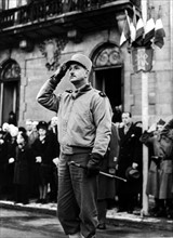 French Brigadier General Dim Carpentier salutes the colors in Belfort (France) November 20, 1944
