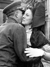 Alsatian girl receives a kiss from  U.S General in Belfort (France),  Fall November ,1944