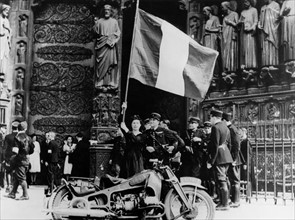 Flag of freedom at  Notre-Dame in Paris (France) August 25, 1944