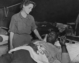 U.S. Black soldier rests in a  French hospital, Summer 1944