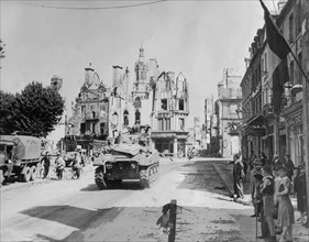 U.S. troops move through Avranches, July 31, 1944