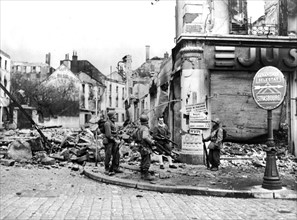 Allied hunt German snipers in razed St. Die,  November 23, 1944