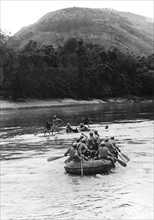 Chinese soldiers ferry across Salween river in China, 1944