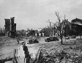 American Army vehicles roll through Pirmasens, March 22, 1945