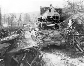 Tanks of the 7th  U.S. Army roll through Silz, March 23, 1945