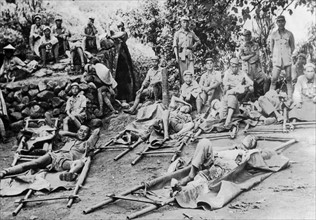 Chinese wounded rest on way to hospital  in the Salween river area, 1944