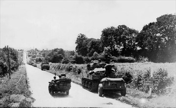 American armored troops await signal for Coutances dash, July 28, 1944