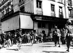 American troops pass through Le Mans,  August 9, 1944
