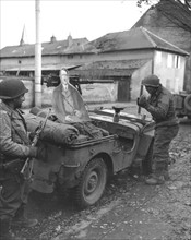 Quick breakfast in the outskirts of Metz,  November 18, 1944