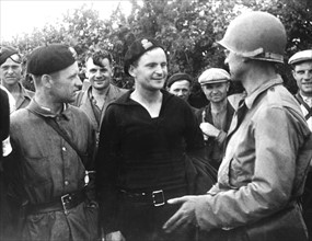 Escaped  Russians hear news of Soviet offensive  in Brittany, September 1944