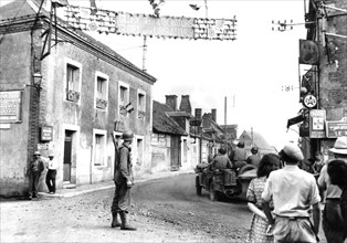 French village cheers U.S. troops on road to Vendôme, August 1944