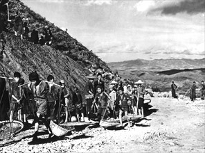 Chinese children aid work on Burma road, 1944
