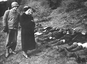 German civilians viewed murdered Russian slave laborers, May 3, 1945
