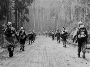 American soldiers advance in the misty Meurthe Valley, November 1944