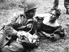 First aid for German prisoners in Normandy beachhead, June 1944