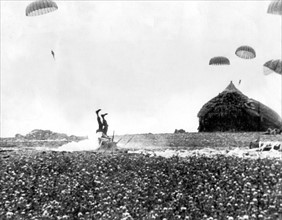 An American paratrooper misses a comfortable haystack in Holland (September 17, 1944)