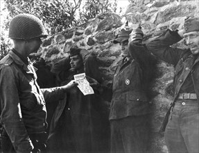 Psychological Warfare leaflet persuades Germans to surrender in France (September 1944).