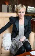 French singer Patricia Kaas and her dog ?Tequilla? sit in a hotel in Moscow, Russia, 14 May 2009.
