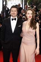 Actor Brad Pitt and actress Angelina Jolie arrive for the world premiere of the film ?Inglorious